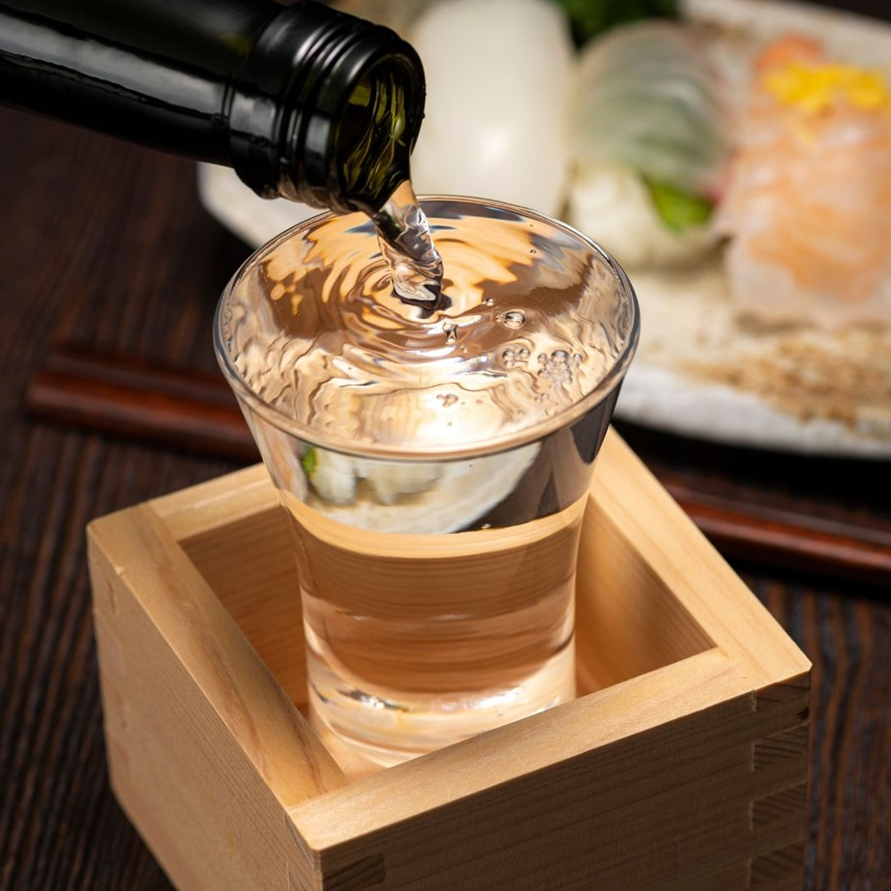Serving Sake In Cypress Masu Cup
