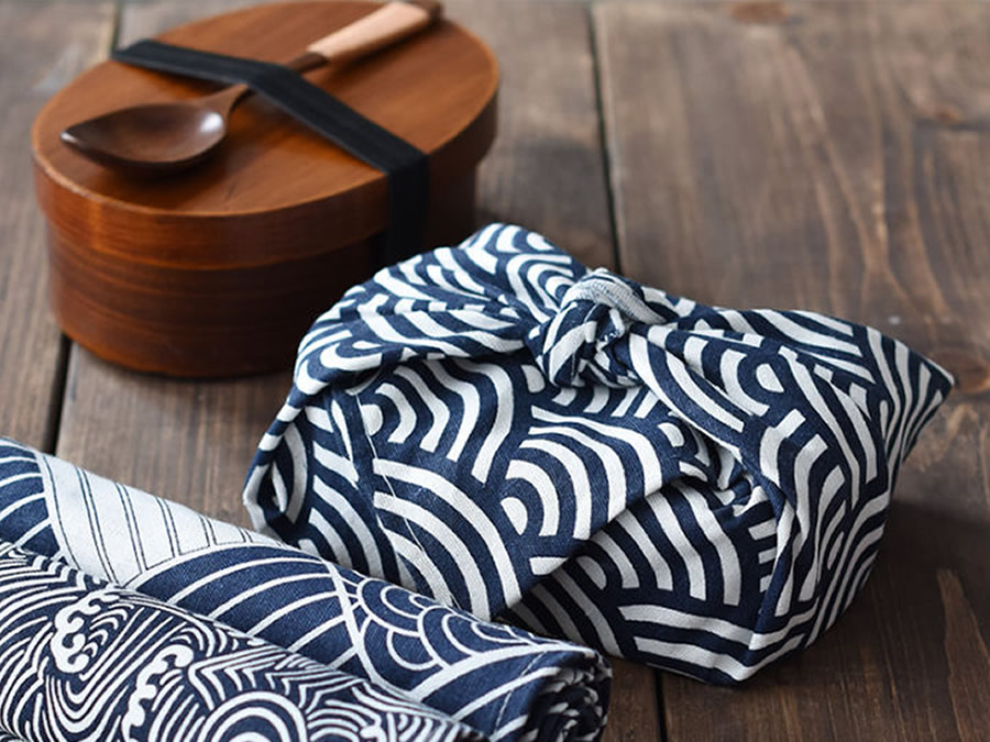 The Everyday Co. How to wrap with a furoshiki using an Everyday Dinner  Napkin