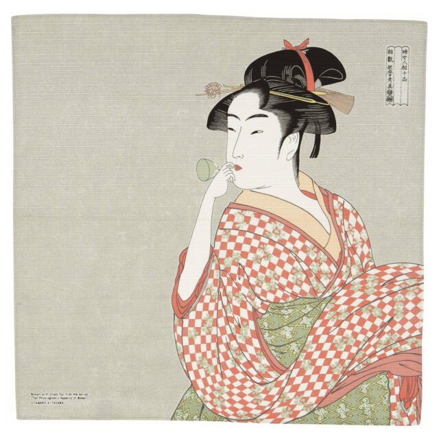 Woman Blowing a Beadro Furoshiki